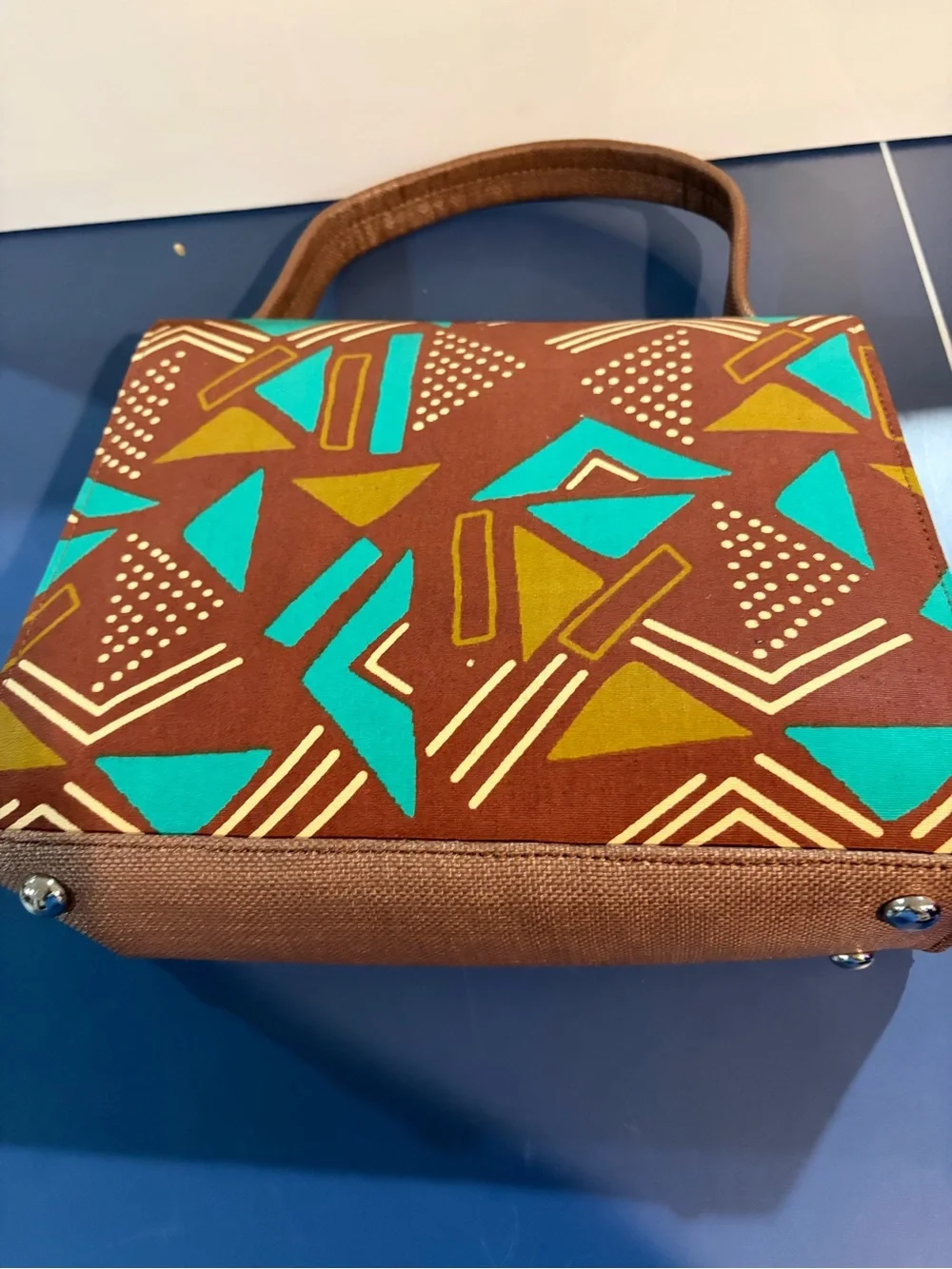 Stylish Brown Canvas Top-Handle Bag with Teal & Mustard Geometric Flap